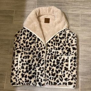 Leopard print fleece vest.